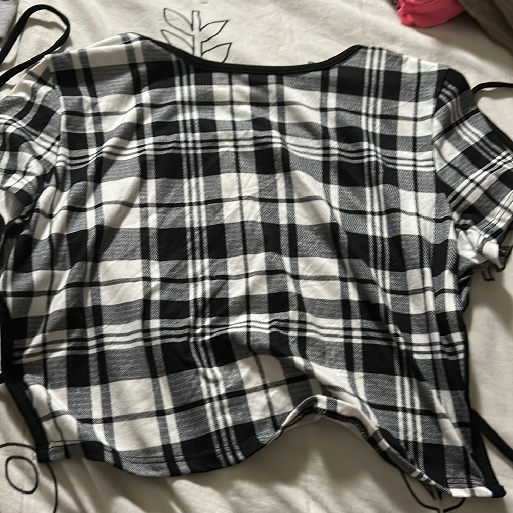 A black and white pattern crop top.